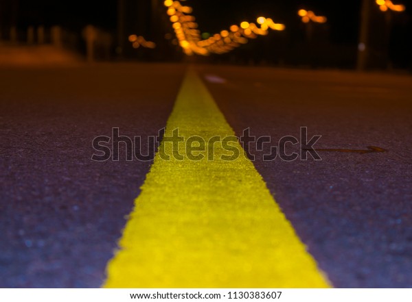 dividing line of a route at\
night
