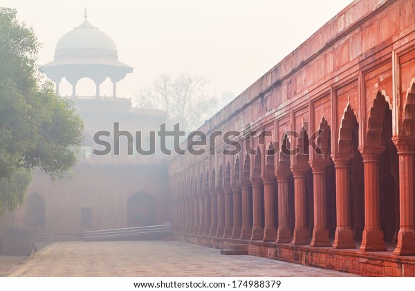 Dividing wall of Formal garden\
(Charbagh or Mughal Garden) in front of Taj Mahal in morning\
mist