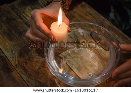 Divination with a candle on the water. concept of magic, divination