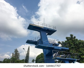 A Diving Board In A Public Swimming Pool.
