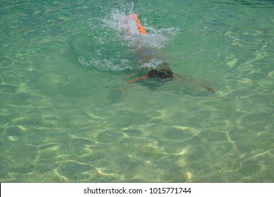Diving in clear water