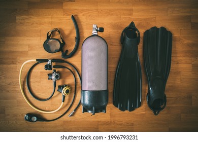 Diving cylinder, fins, snorkel set,  and scuba regulator