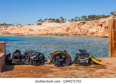 Diving Equipment On Sunny Pier At The Coast Of Red Sea In Sharm El Sheikh, Sinai, Egypt, Asia In Summer Hot. ?oral Reef And Crystal Clear Water. Famous Tourist Destination Diving And Snorkeling