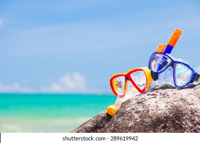 Diving Goggles And Snorkel Gear Stone Near Beach