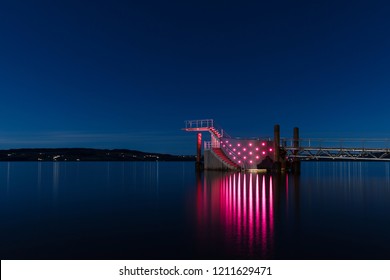 Diving Tower With Pink Lights On A Pier In Hamar City, Norway. Beautiful Blue Night Sky During Autumn. 