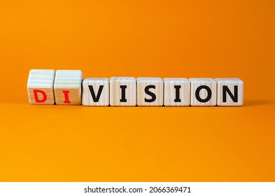 Division or vision symbol. Turned cubes and changed the word 'division' to 'vision'. Beautiful orange table, orange background. Business, division or vision concept. Copy space. - Shutterstock ID 2066369471