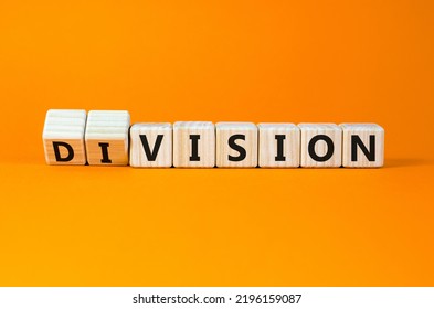 Division Or Vision Symbol. Turned Cubes And Changed The Word 'division' To 'vision'. Beautiful Orange Table, Orange Background. Business, Division Or Vision Concept. Copy Space.