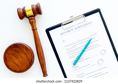 Divorce Court Case. Divorce Agreement Near Wedding Rings And Judge Gavel On White Background Top View