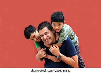 Divorced single dad and dark haired latin sons play and have fun spend quality time together without technology in poor
 - Shutterstock ID 2205755581