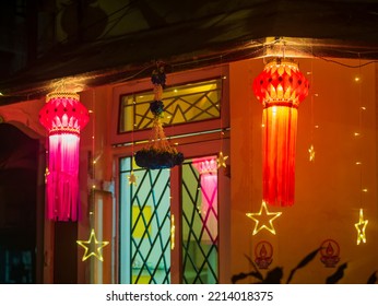 Diwali decorative lamps  or Akash Kandil or Lantern lights hanging outside traditional indian home or chawl in Mumbai - Shutterstock ID 2214018375