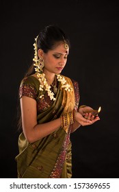 Diwali Or Deepavali Photo With Female Holding Oil Lamp During Festival Of Light 