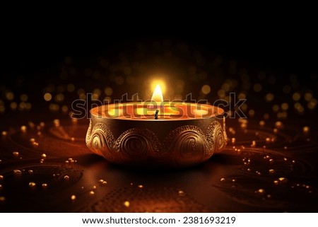 Diwali festival golden lamp with candle light in dark night bokeh background 