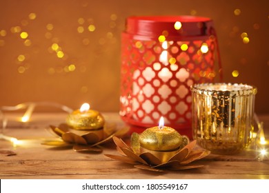 Diwali Holiday Home Decorations On Wooden Table.