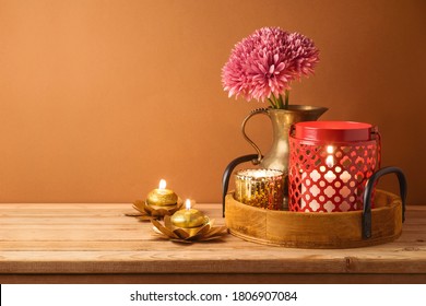 Diwali Holiday Home Decorations On Wooden Table.