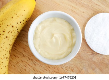 Diy Banana Mask (face Cream) In The Small White Bowl. Natural Homemade Hair Treatment And Zero Waste Concept. Top View, Copy Space
