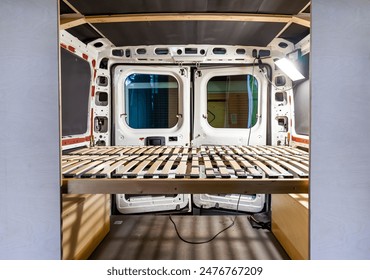 DIY Camper Jumper van conversion. Building the bed frame inside a camper van. building bed inside motorhome. customizing of handcrafted indoors camper van. 