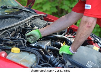 DIY Car Repair Outdoors. Car Repair And Maintenance Tasks Don't Always Have To Be Done In The Shop