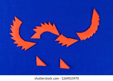 Diy Chinese Dragon On Blue Background. Gift Ideas, Decor Chinese New Year. Handmade Red Gold Lunar Dragon Lion From Modular Origami. Step By Step. The Process Of Crafts. Top View.