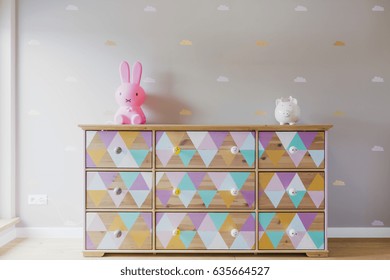 DIY colorful patterned commode with toys in pastel girl room