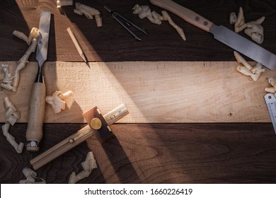 DIY concept. Top view of the woodworking and crafts tools. Carpentry hand tools. Wooden background.