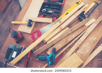 DIY craftsperson wood heap carpenter objects woodwork handyman desk. Architect tools with ruler measure hammer home improvement equipments. Wooden builder carpenter repairing construction workshop - Powered by Shutterstock