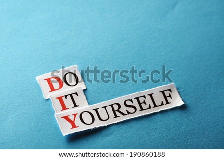 DIY Do It Yourself, words on cut paper hard light