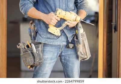 Diy, man and drill for construction, building or home repair, renovation and improvement. Equipment, handyman and male ready for maintenance, architecture or design, creation and creative at home - Shutterstock ID 2264799859
