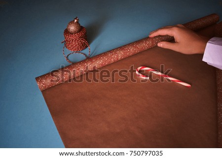 Diy Packing Christmas Vintage Paper and Female Hand. Winter Red Candy