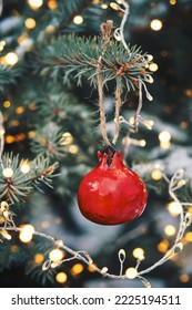 Diy pottery toy on Christmas tree. Pomegranate bauble sustainable Christmas tree decoration. Christmas zero waste. - Shutterstock ID 2225194511