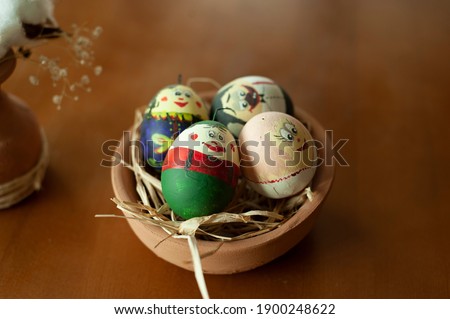 DIY projects while staying home, egg painting as a hobby and free time activity, colorful eggs, a hand made clay pot and vase, eco-friendly hobby suggestions 
