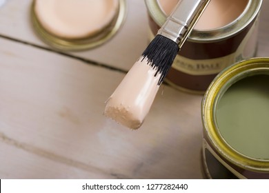 Diy Tester Pot Of Paint And Paintbrush For House Decoration And Improvement On Wooden Floor