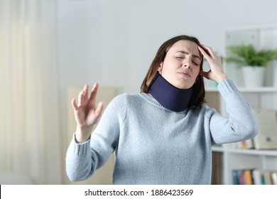 Dizzy Woman Wearing Neck Brace Suffering Standing At Home