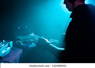 DJ For The Equipment In The Neon Light And The Rhythm Of Music