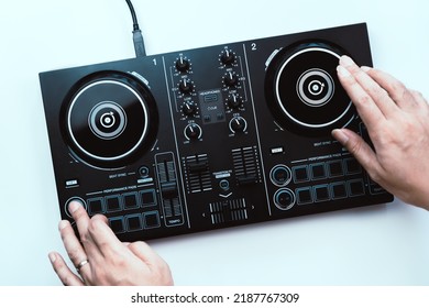 Dj Hands Is Scratching And Mixing Digital Dj Deck Controller, Topview, Isolated On White.