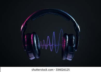 Dj Headphones and disco waves isolated on black background