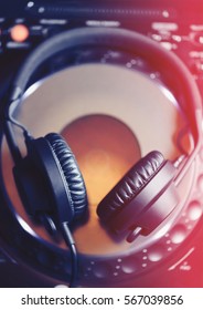 Dj Headphones Top View.Overhead Shot Of Professional Disc Jockey Headset On Digital Cd Player Turntable.Audio Technology For Night Club Party