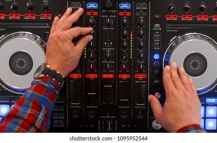 DJ Man Plays On Musical Equipment. Top View