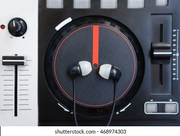 Dj Midi Turntable Top View.Overhead Shot Of Disc Jockey Sound Mixer With Headphones.Tour Dj Audio Equipment.Digital Turn Table Music Player For Club Party.DJ Poster Background.Mix Music On House Party