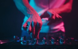 DJ Mixing Music On A Party. Club Disc Jockey Playing Music On Stage
