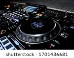 Dj Music Club Controller Pioneer with dj decks and mixer. Music Equipment and Dj Gear for Nightclubs, Party and Stage. Electronic Dance Music Background.