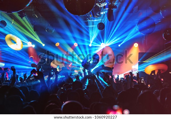 dj\
night club party rave with crowd in music\
festive