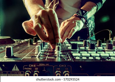 DJ Playing Music At Mixer Closeup