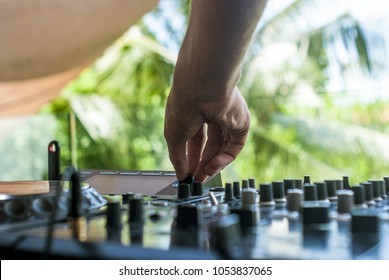 DJ Is Playing Music At The Pool Party.