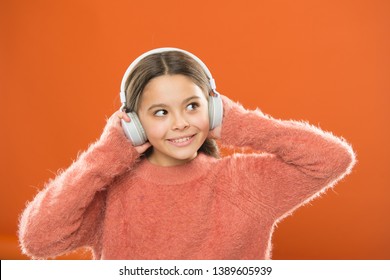 DJ, Put The Record On. Cute Small Child Wearing DJ Headphones. Little Girl Listening To Music And Dancing On Silent Disco In Earphones. Adorable DJ Girl. Enjoying Music Playing On DJ Party.