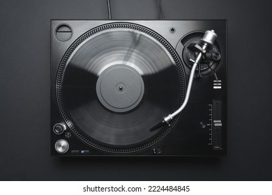 Dj turntable in flay lay. Vinyl record player shot directly from above on black background  - Powered by Shutterstock