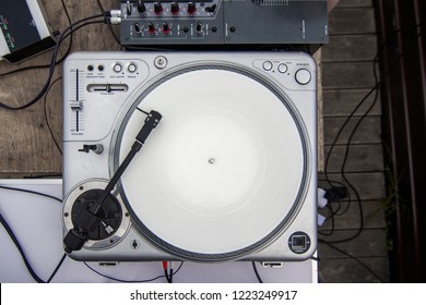 DJ Turntable On The Table Top View. Mixing Console. Scratch