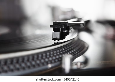 Dj Turntable Player Playing Vinyl Record Disc With Hip Hop Music.Closeup,focus On Needle Cartridge Headshell.Disc Jockey Audio Equipment For Scratch.Hifi Sound System