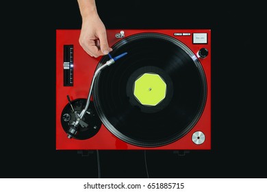 DJ Turntable Playing Music With Hand. Top View