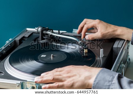 DJ Turntable playing Record, Hand Tunning Pitch Control