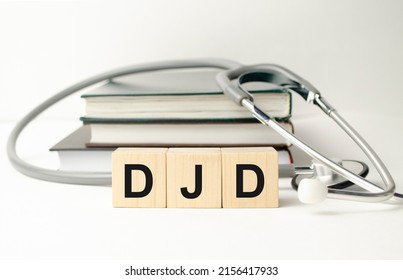 DJD Degenerative Joint Disease - Word From Wooden Blocks With Letters